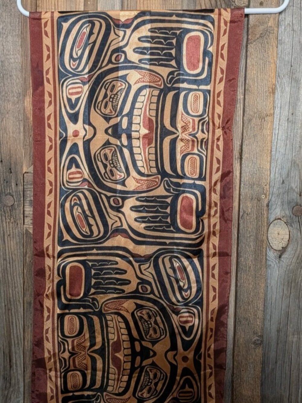 Silky Scarf with Northwest Native Design, Measures 61 in by 13 in